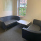 Twin matching set of Orangebox Cwtch navy blue and contrast grey leather sofas (160cm x 80cm)