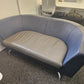Twin matching set of Orangebox Cwtch navy blue and contrast grey leather sofas (160cm x 80cm)