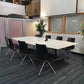 Large Boardroom table in white, with eight black leather meeting chairs