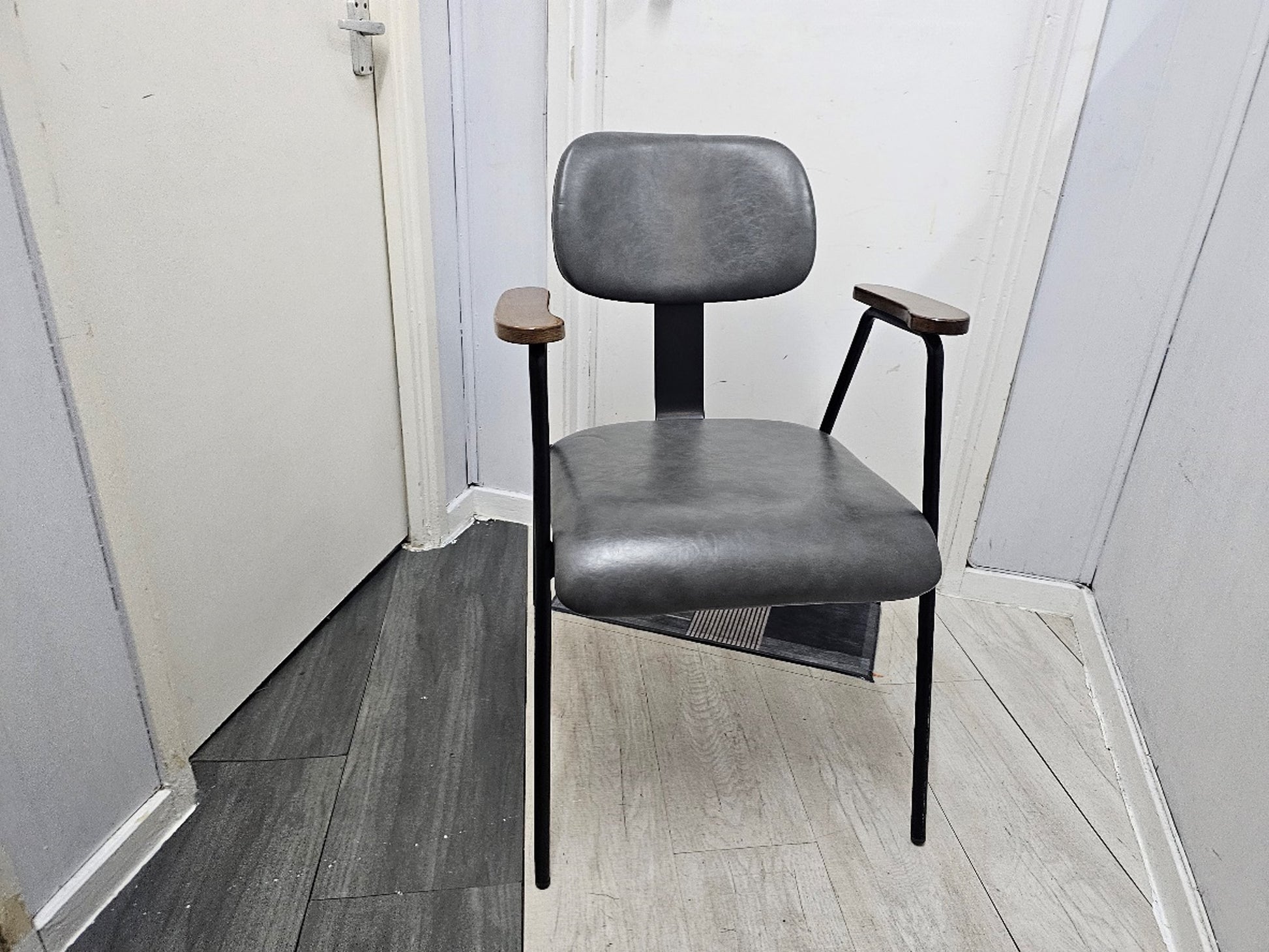 Grey leather waiting room chair