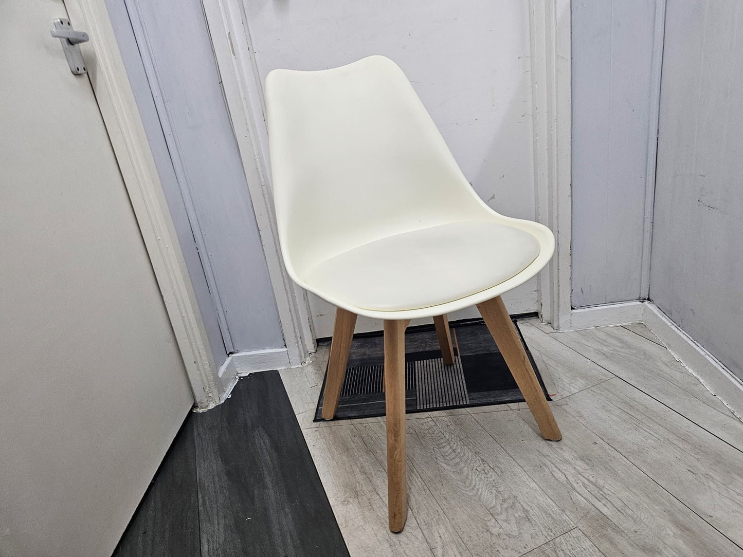 White Chair with Eiffel-Style Wooden Legs