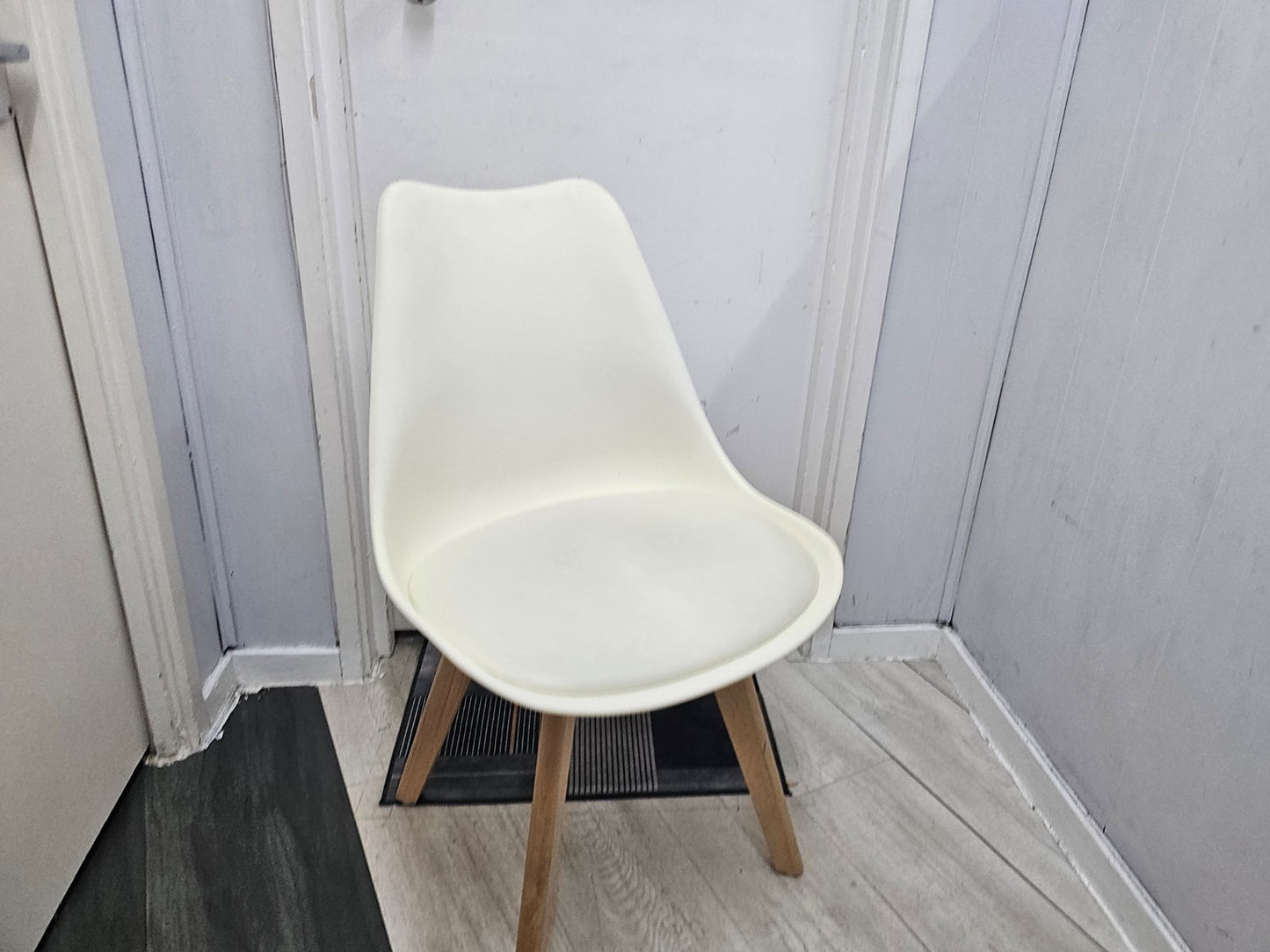 White Chair with Eiffel-Style Wooden Legs