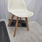 White Chair with Eiffel-Style Wooden Legs