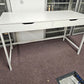 White IKEA Alex Office Desk in front of large window