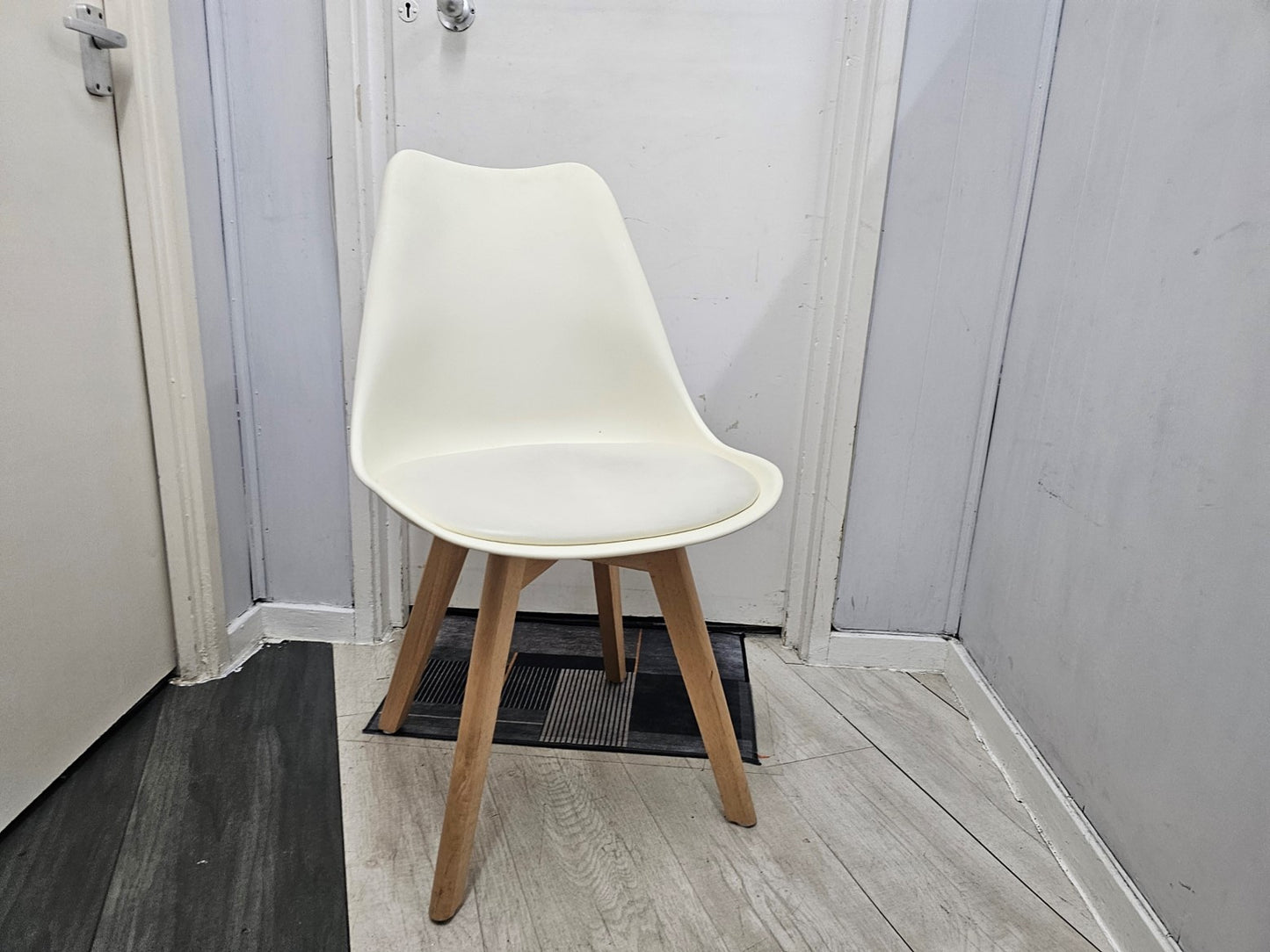 White Chair with Eiffel-Style Wooden Legs