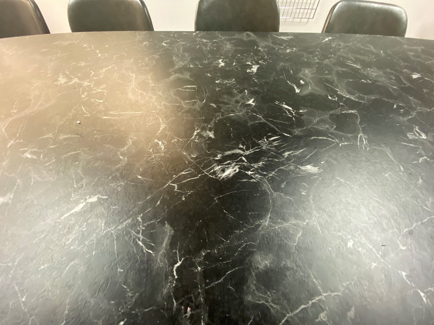 Tabletop of office meeting table in black marble look