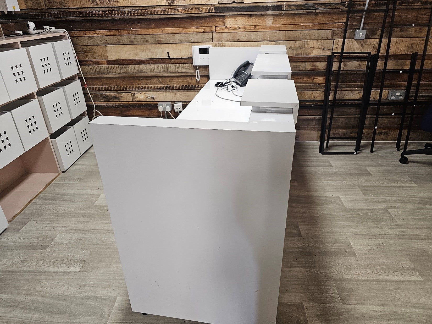 White salon reception table with transaction top