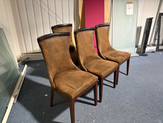 Used modern-style brown dining chairs