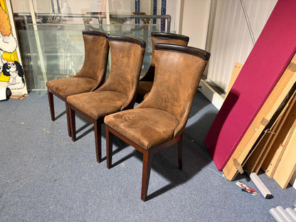 Used modern-style brown dining chairs