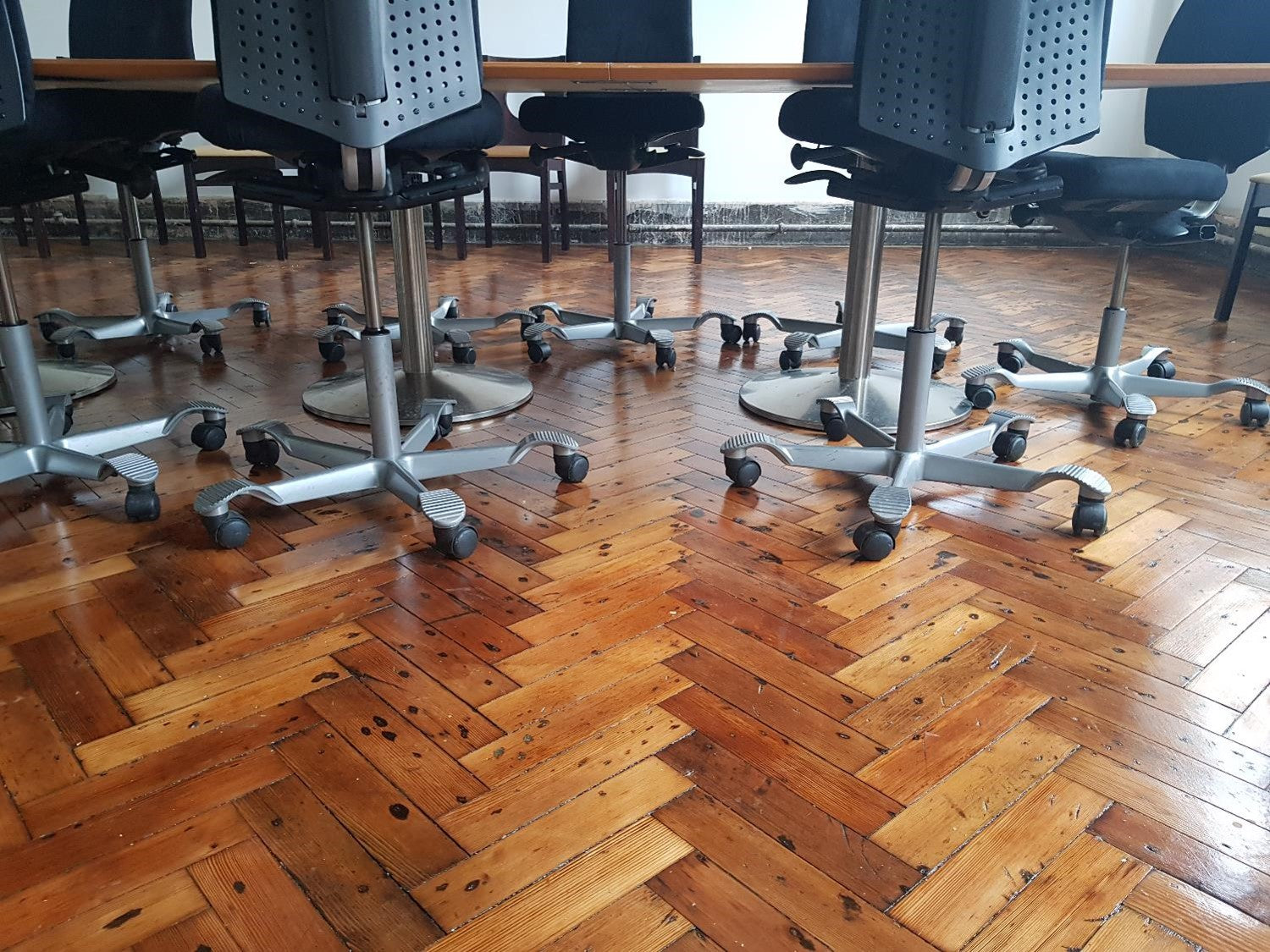 Black and brown conference room table and chairs