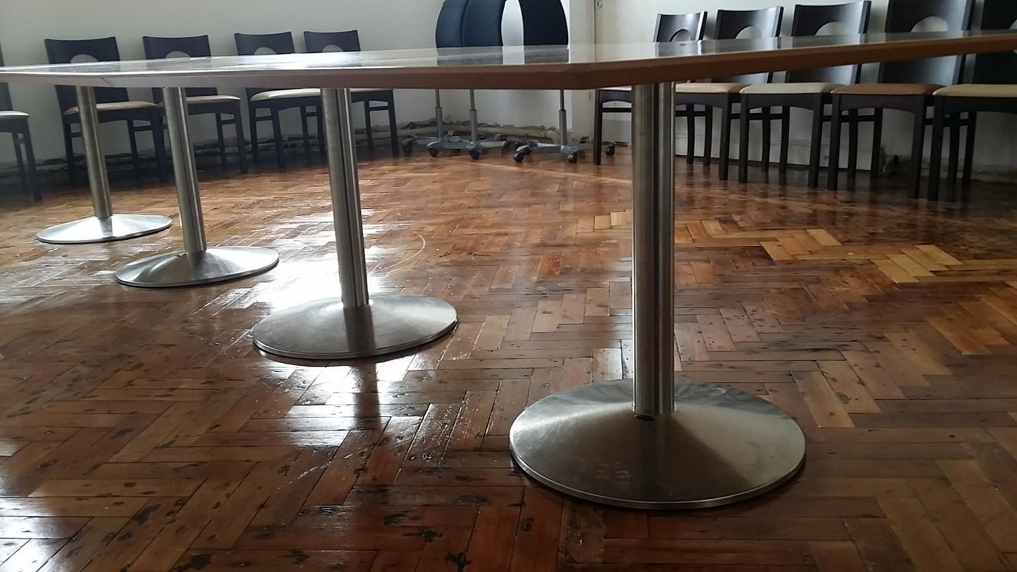 Chrome leg framework of large office conference table