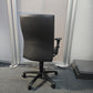 Back of black leather desk chair