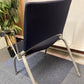 Blue and grey dining chair on carpet