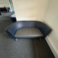 Reception area sofa in blue and black by Orangebox Cwtch