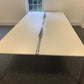 Tabletop of bank of 4 office desks