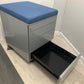 Open bottom drawer of four drawer mobile small cabinet