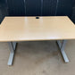 Light brown electric stand up office desk, sit stand height adjustable table in maple finish