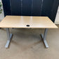 Light brown electric stand up office desk, sit stand height adjustable table in maple finish