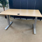 Light brown electric stand up office desk, sit stand height adjustable table in maple finish
