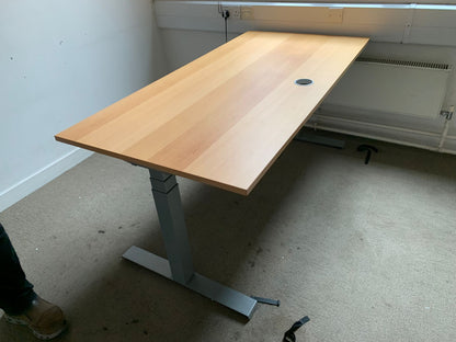 Used Dark beech electric sit stand office desk, height adjustable  160cm x 80cm