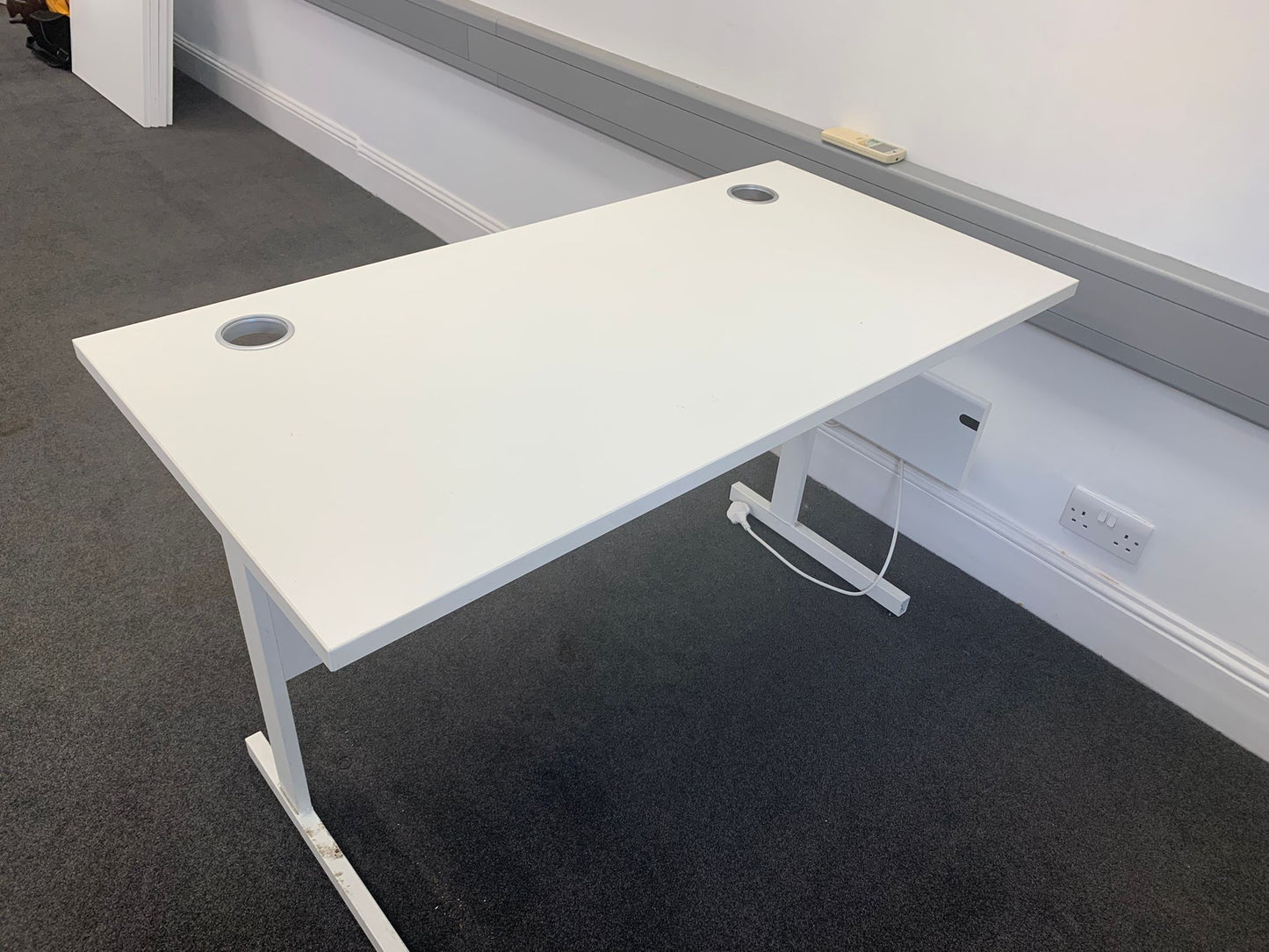 Used Office desk white single freestanding cantilever cable port holes 120cm x 60cm