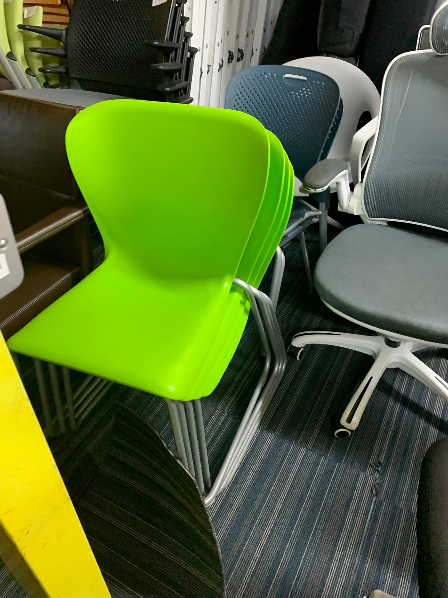 Used steelcase West side chair in green sled leg base