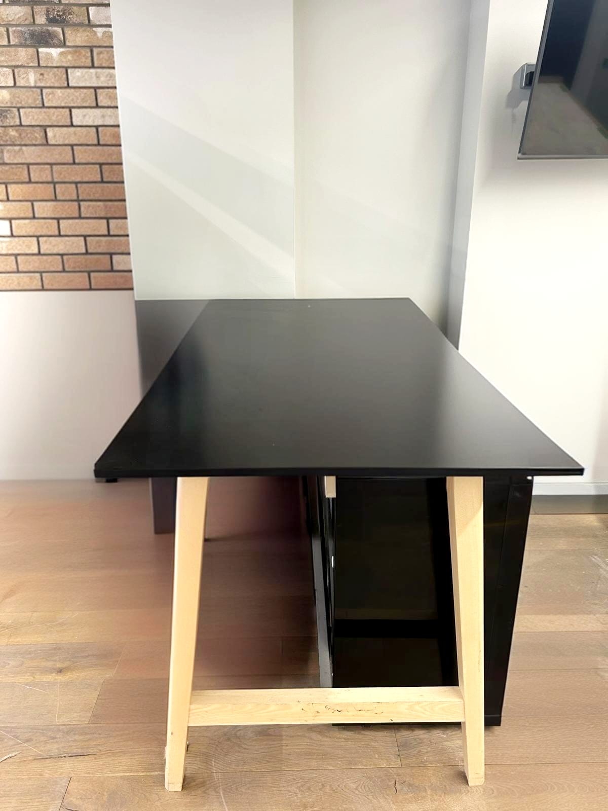 Per-owned Nordic style high table with sleek black top and light wood frame H107cm W90cm D180cm
