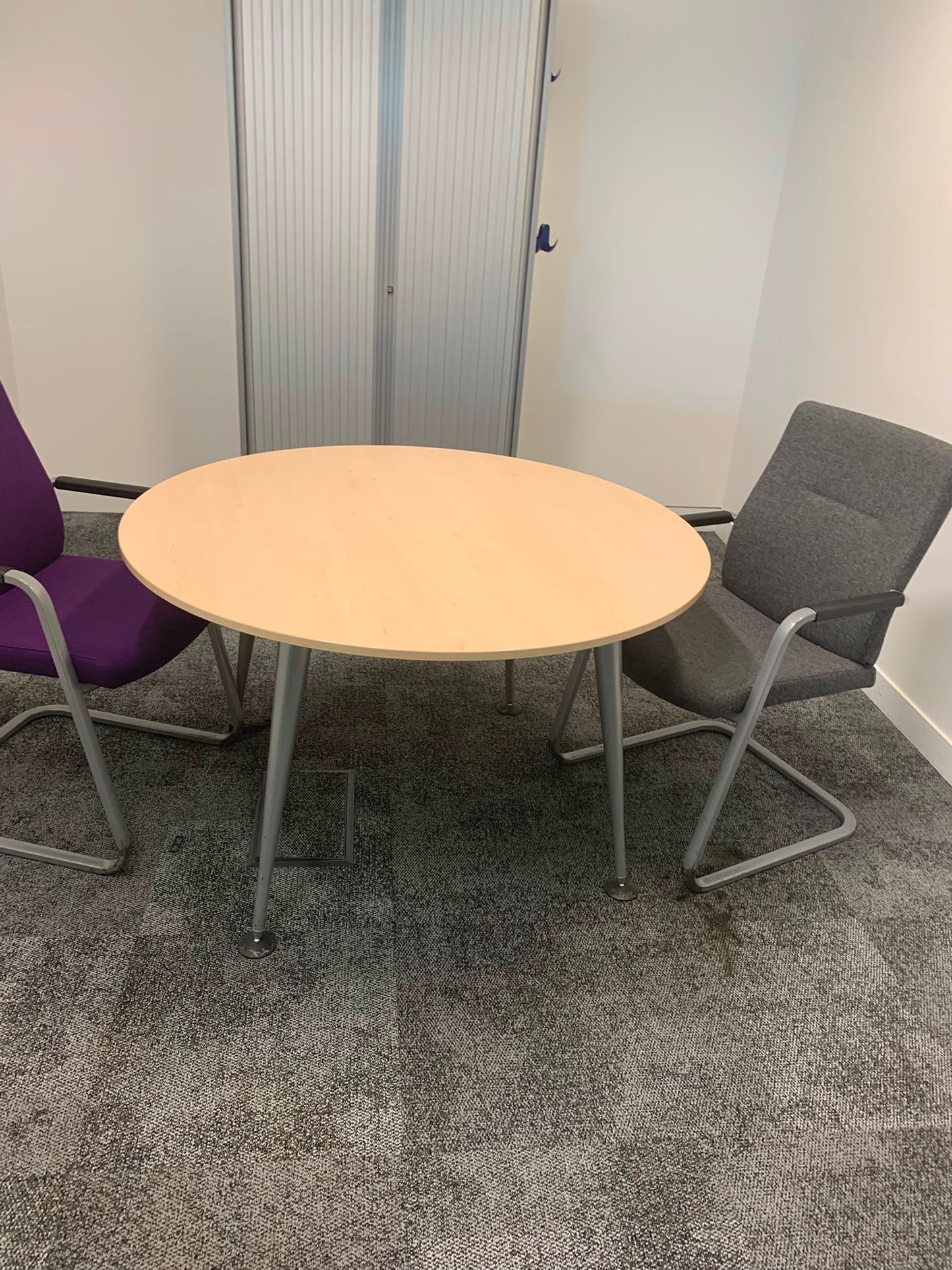 Second hand Herman miller office breakout circular metal legs maple top table 100cm diameter