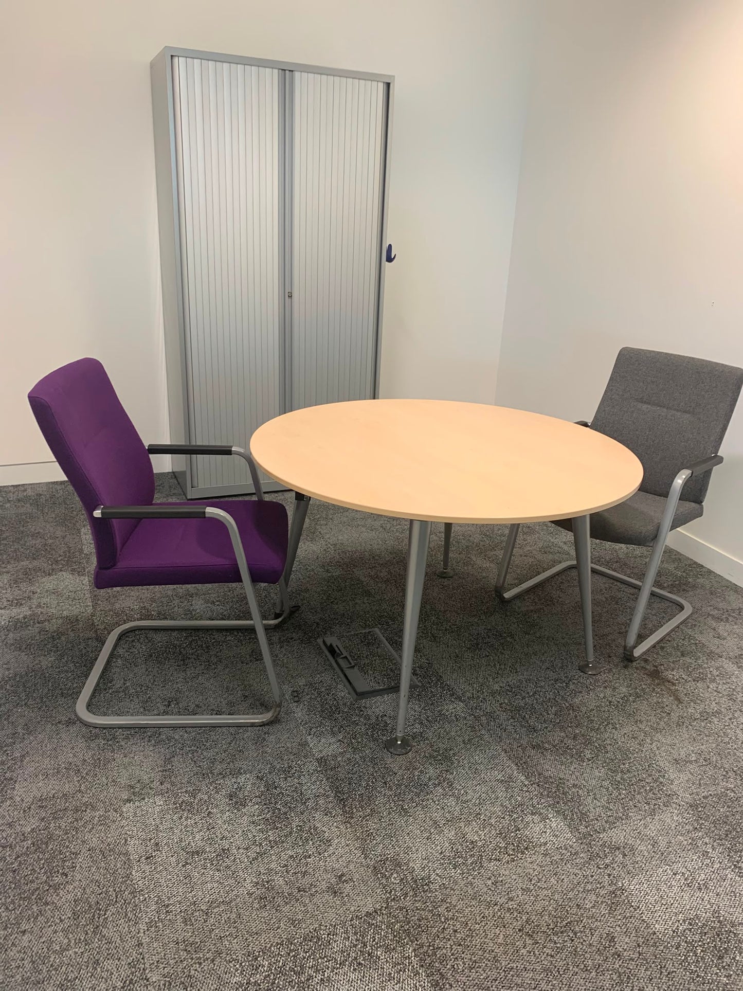 Second hand Herman miller office breakout circular metal legs maple top table 100cm diameter