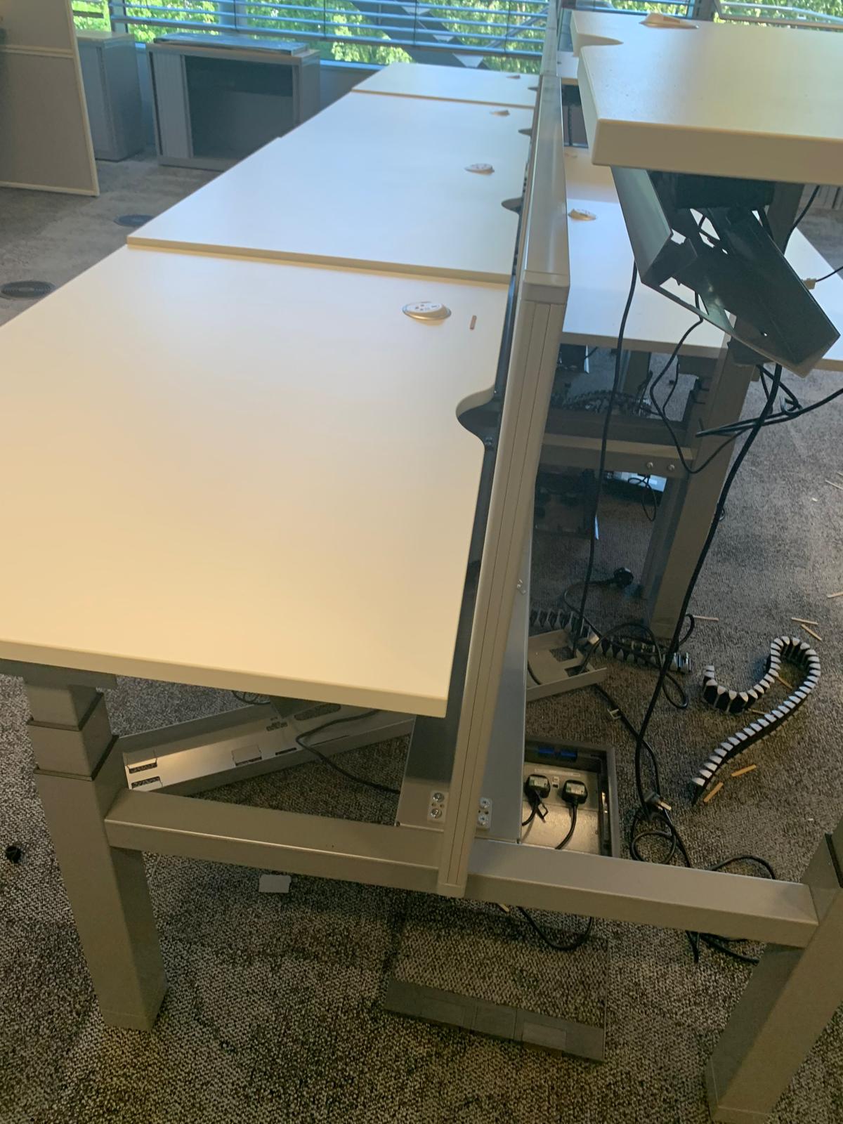 Preowned Senator white finish sit stand stand up twin electric desk 120cm w 80cm d h Highest 125cm lowest 65cm