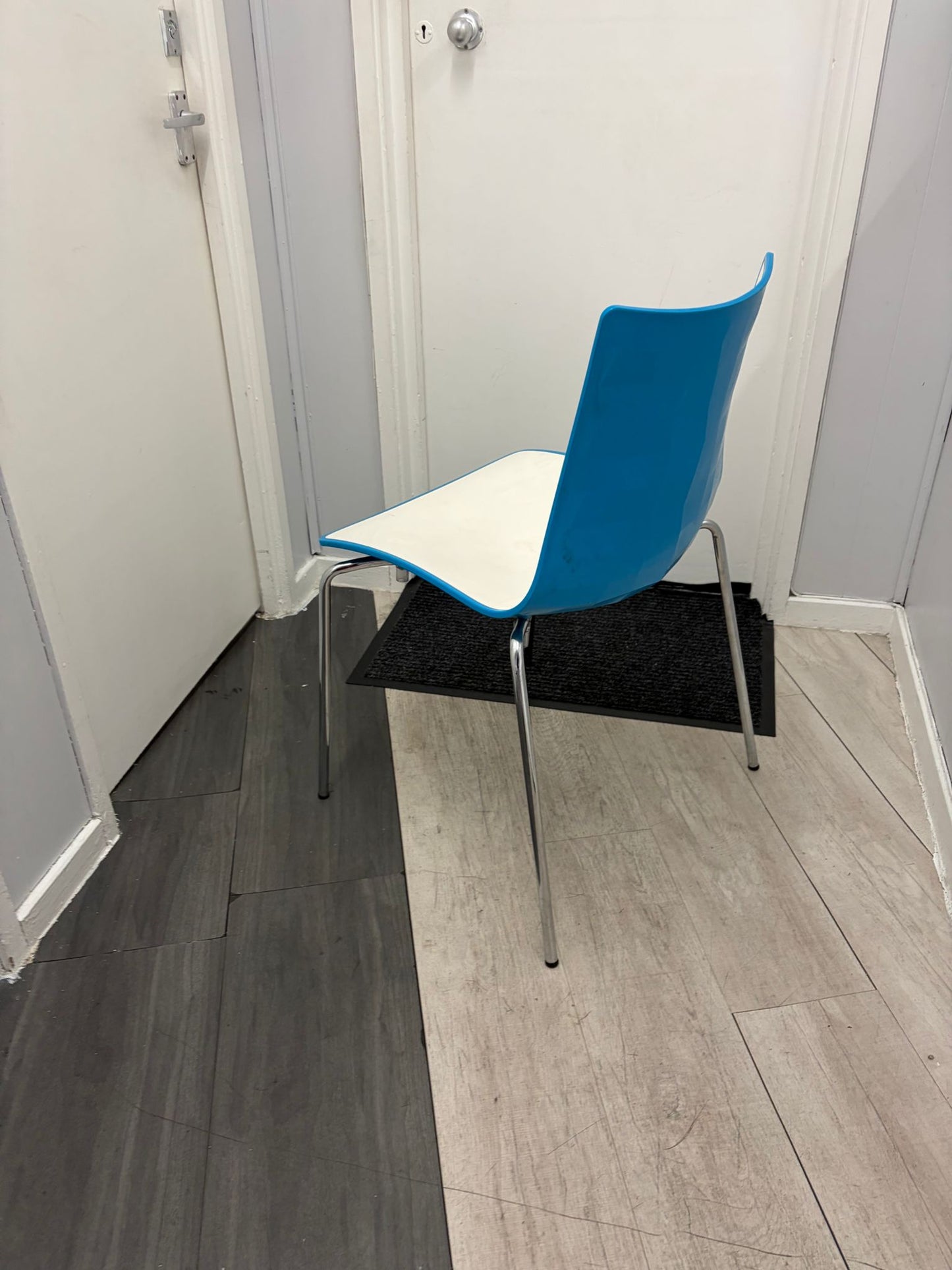 Secondhand dining chair with chrome legs - stackable turtle shell design