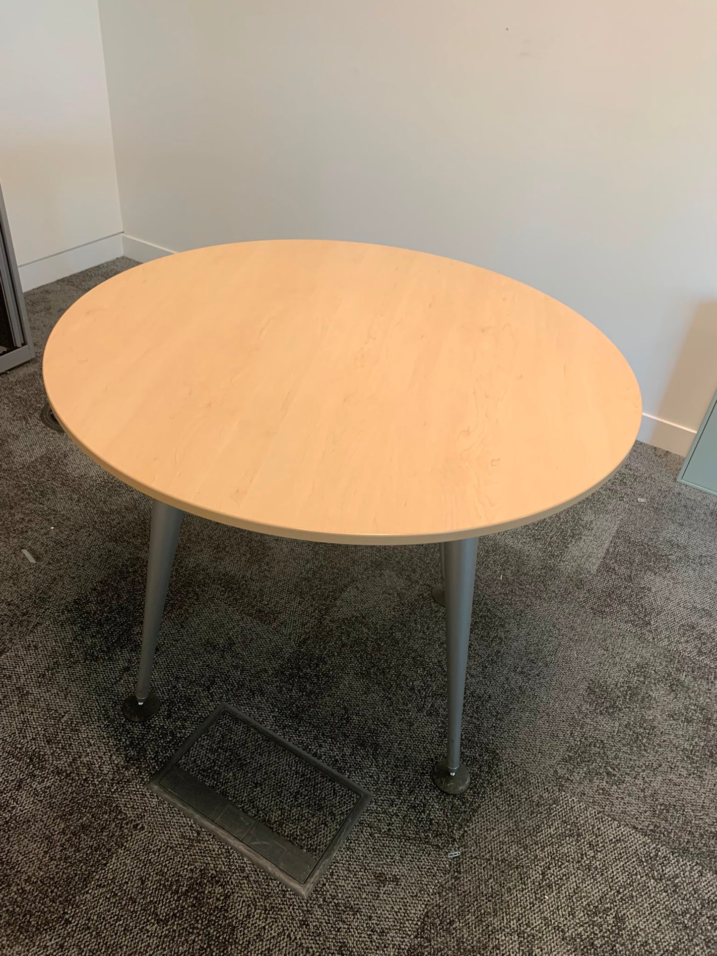 Second hand Herman miller office breakout circular metal legs maple top table 100cm diameter
