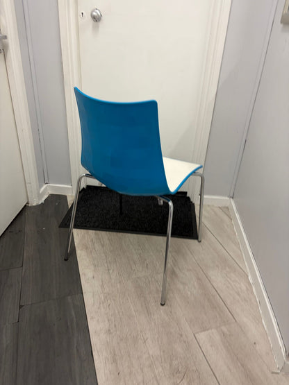 Secondhand dining chair with chrome legs - stackable turtle shell design