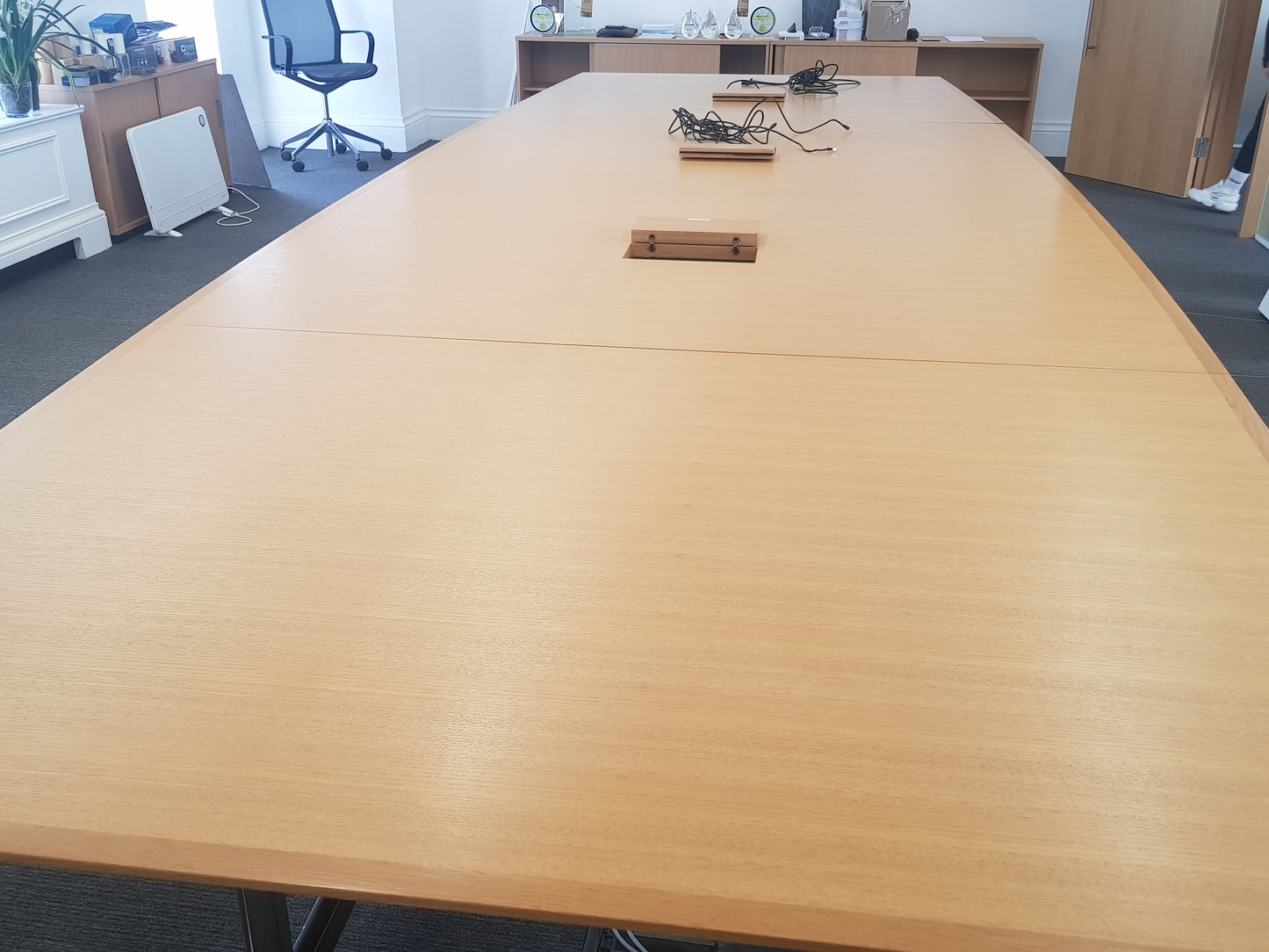 extra large office boardroom table in a room