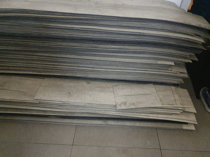 Heavy duty high quality vinyl flooring tile in a neutral mushroom colour 151.6cm x 22.8cm