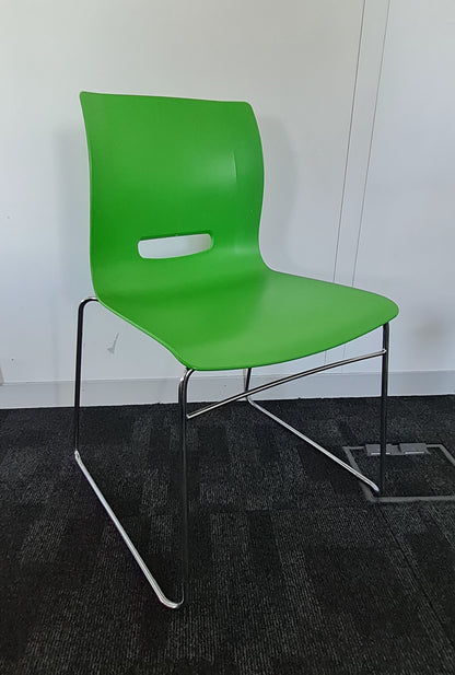 Green senator chair with chrome cantilever chair