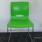 Green Senator dining chair on carpet