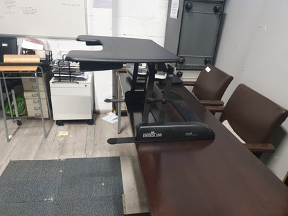 Used Vari desk height adjustable Black 77cm x 52cm