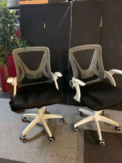 Used operator adjustable swivel chair Black and white contrast