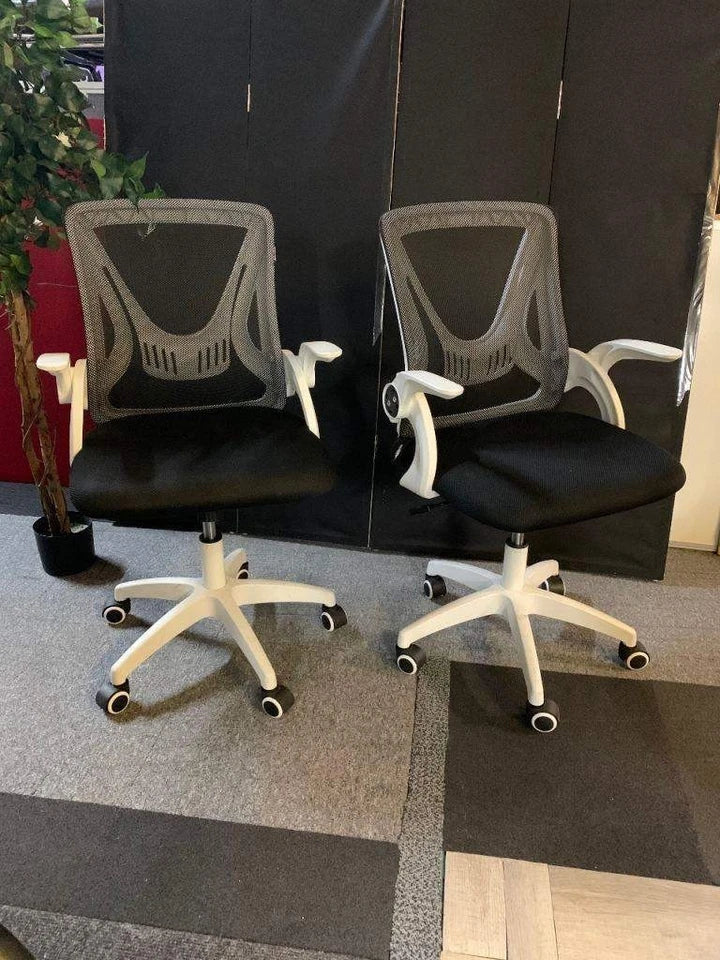 Used operator adjustable swivel chair Black and white contrast
