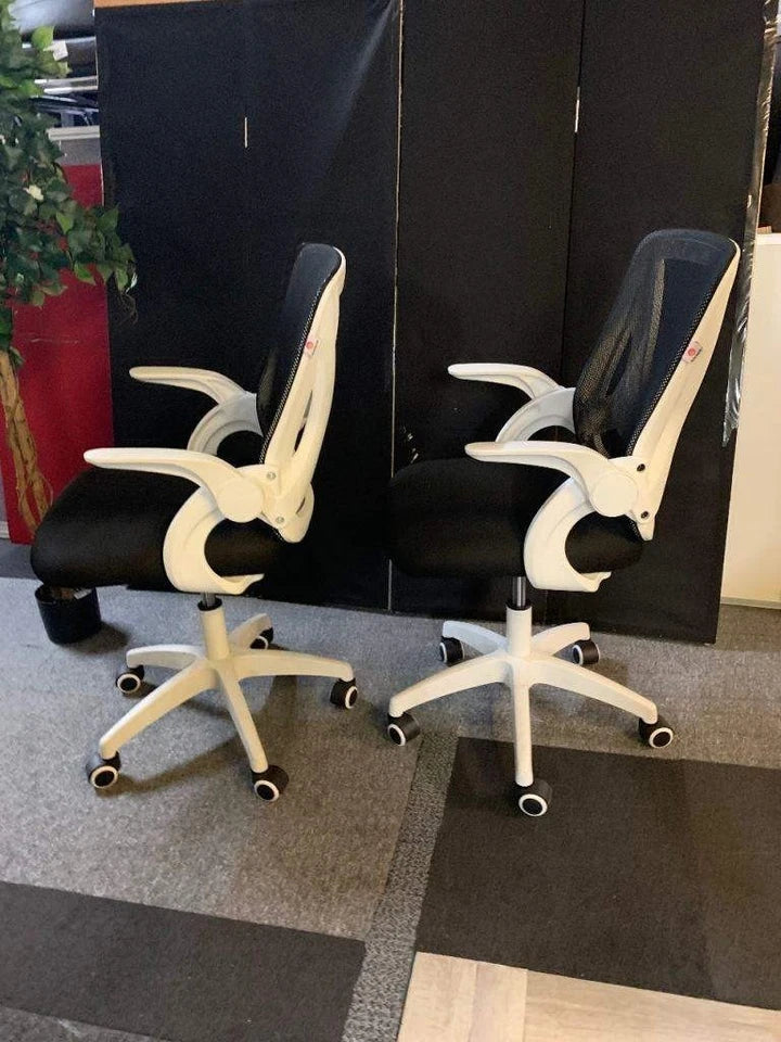 Used operator adjustable swivel chair Black and white contrast