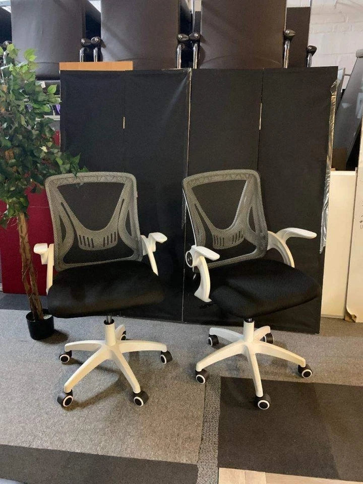 Used operator adjustable swivel chair Black and white contrast