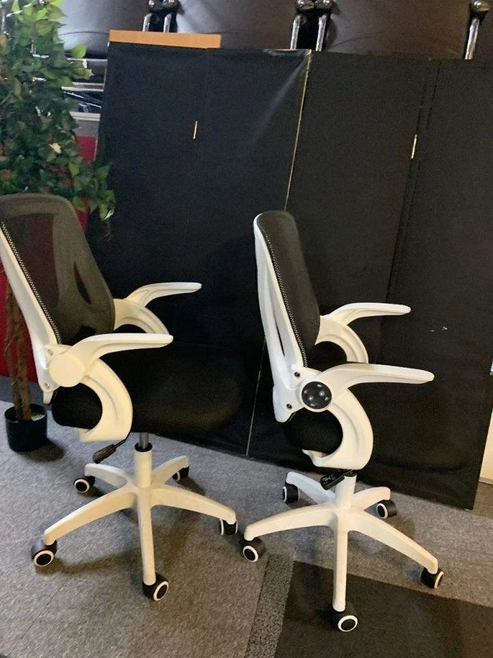 Used operator adjustable swivel chair Black and white contrast