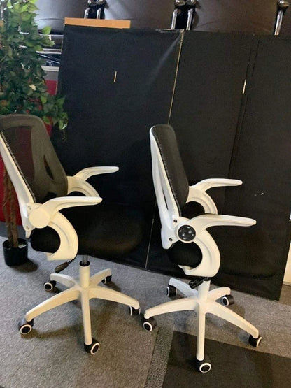 Used operator adjustable swivel chair Black and white contrast