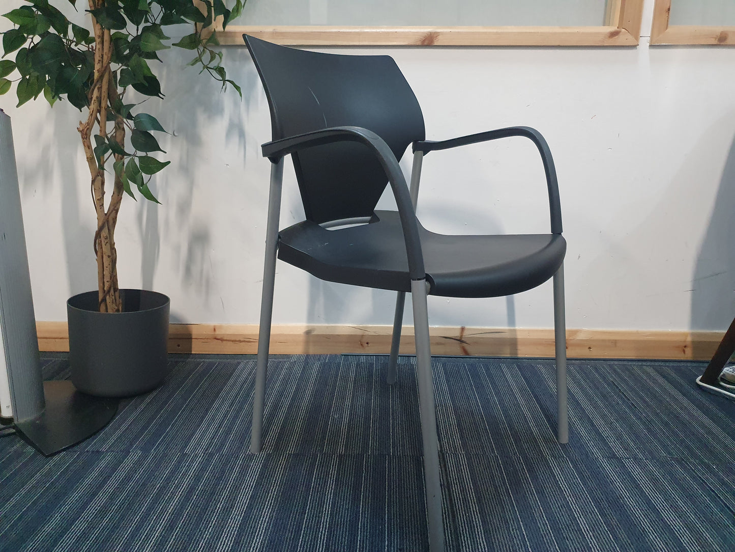 side of office meeting stick chair in black with armrests