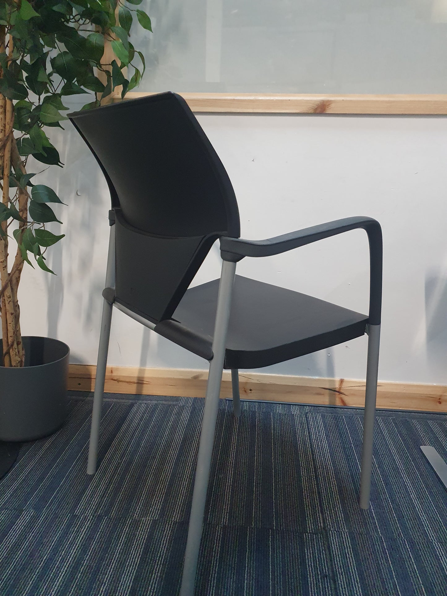 back of office meeting stick chair in black with armrests