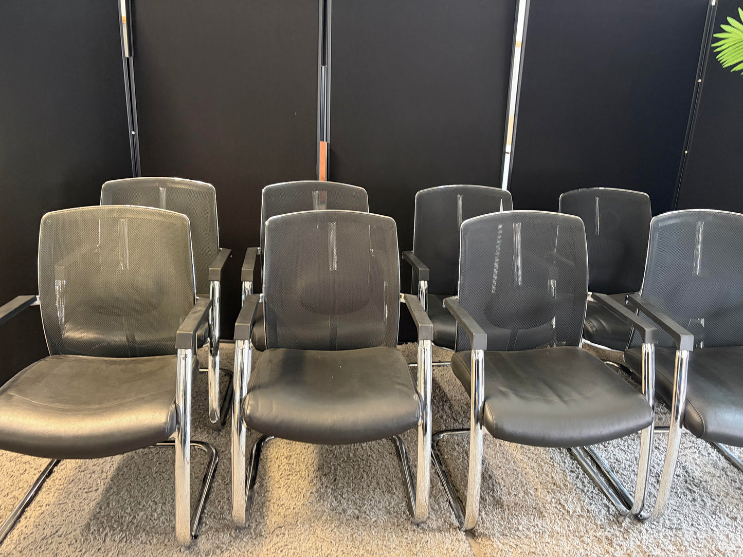 Pre-owned leather meeting chairs with mesh back