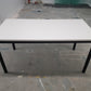 white folding office table with black legs