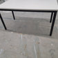 black legs of white folding foldable office table 