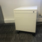 White mobile small cabinet on wheels